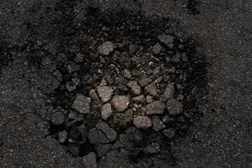 Broken asphalt