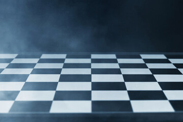 Empty chess board on dark background