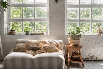 Fotobehang Boho Comfortable lounge room interior in bohemian style  © brizmaker