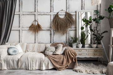Comfortable lounge room interior in bohemian style