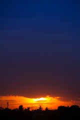 Fototapeta premium blue sky yellow sunset vertical background