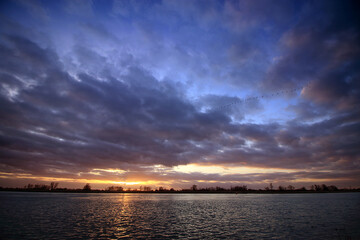 
Colorful sunset by the Odra River, Poland.