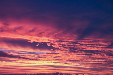 Summer sunset. Evening sky with orange clouds.