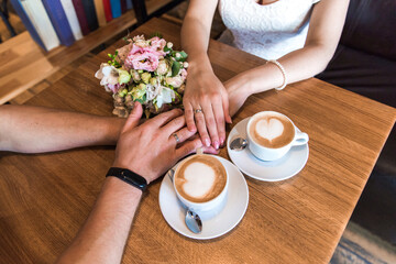 young woman with cup of coffee