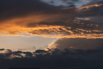 Fototapeta premium dramatic sky at sunset with clouds