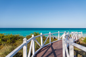 A nice wooden walking path to the Caribbean sea on a small island next to Cuba