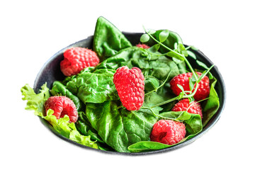 salad raspberries and lettuce, spinach, arugula Menu concept serving size. food background top view copy space for text organic healthy eating keto or paleo diet
