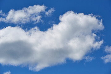 Air clouds in the blue sky. Nature background
