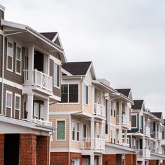 Square crop Row of modern upmarket duplex apartments day light