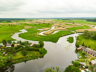Biebrza Podlasie Biebrzański Park Narodowy Rzeka trzcina wieś bagno pole łąka widok z drona