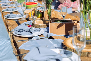 picnic table in blue tones for many guests