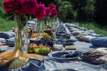 picnic table in blue tones for many guests
