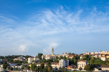 Panorama of the old city of Belgrade with a focus on Saint Michael Cathedral, also known as Saborna Crkva, with its iconic clocktower seen from afar. belgrade is the capital city of Serbia.
