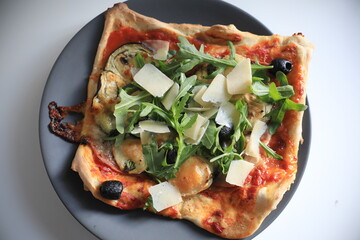 Home made yummy pizza with rucola