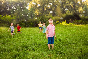 Children are delighted watching the soap bubbles