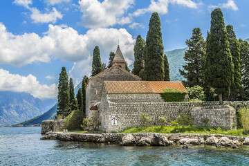 Fototapeta premium Benedictine monastery from the 12th century on George Island. George Island is one of the two islets off the coast of Perast in Bay of Kotor (Boka Kotorska), Montenegro.