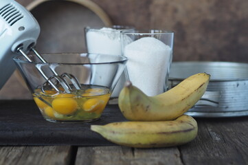 Confectionery background. Stage of cooking biscuit with banana. Cooking a pie of three ingredients.