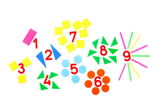 Multicolored plastic figures and numbers on a white background. Educational games for children. Math and calculation skills.