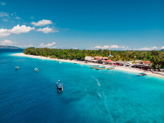 Fototapeta na wymiar Tropical island with paradise beach and turquoise sea. Aerial view of Gili Meno