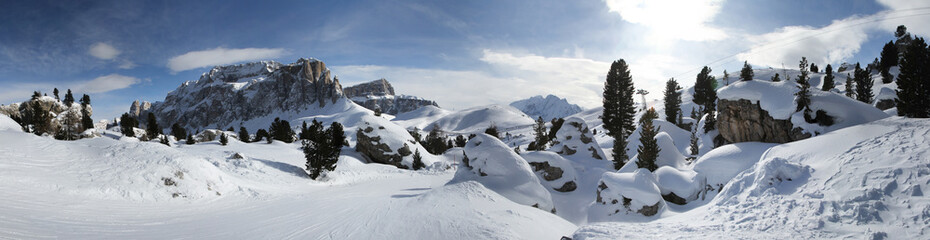 Panoramic winter view of Alpine mountains. Dolimites. Sella Ronda. Alta Badia. South Tirol....