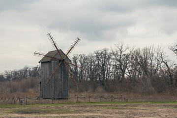 Fototapeta premium Wooden windmill on the island of Khortytsia in Zaporizhzhia. Ukraine
