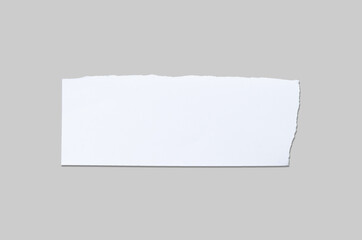 White ripped note paper, paper different shapes scraps isolated on gray background. with clipping path.