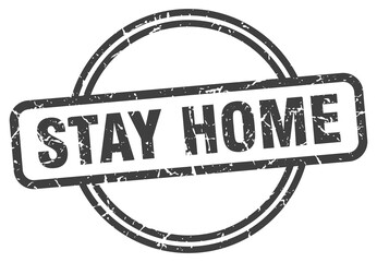 stay home grunge stamp. stay home round vintage stamp