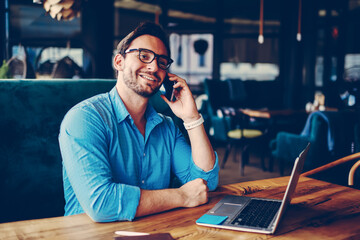 Professional male trader having business conversation with partners