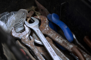 Keys in the toolbox. Repair tools.