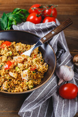 Couscous with turkey, tomatoes, champignon mushrooms and avocado.