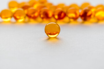 Omega 3 Fish oil capsule on white surface