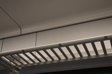 shelffor bags with symbols in train