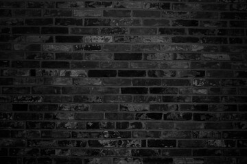 Black brick wall background. Black stone texture.