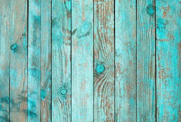 Verwitterte blaue hölzerne Hintergrundbeschaffenheit. Schäbiges Holz blaugrün oder türkisgrün lackiert. Vintage Strandholzkulisse. © ita_tinta_