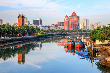 Haidian River View with Landmark Haikou Clock Tower and Historical Buildings in the Morning.