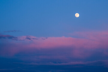 Beautiful moon in the dusk. Landscape format.