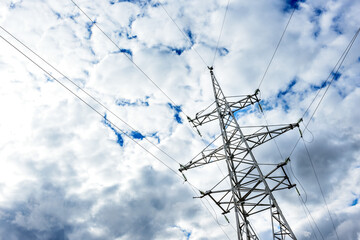 High voltage post. High voltage tower on blue background.