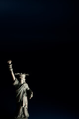 Black lives matter. Statue of Liberty on dark background with copy space.