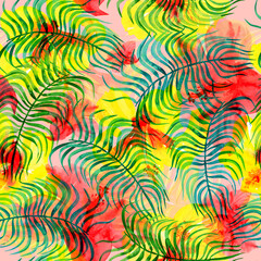 Tropical seamless print with palm leaves on a watercolor colorful floral background.