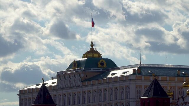 State flag of the Russian Federation over the Grand Kremlin Palace, the ceremonial residence of the President of Russia