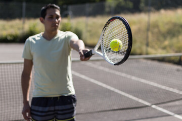 professional tennis player playing with racket