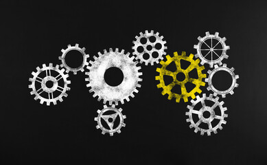 Drawing of gear mechanism on chalkboard. Illustration