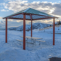 Square Pavilion on the seewping snow covered terrain of Wasatch Mountain in winter