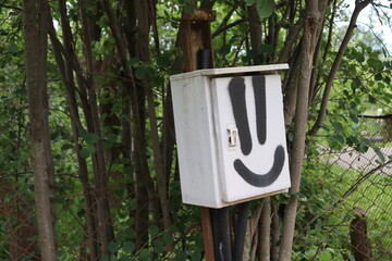 postal box with smile symbol