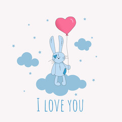 Cute rabbit holds a heart-shaped balloon 
