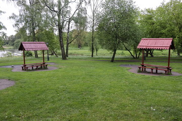 barbecue arbors in rainy park