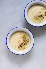Vegan celery cream soup with pumpkin seeds 