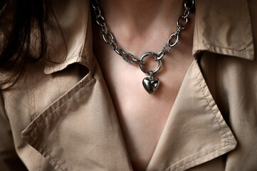 Heart-shaped necklace dressed on a girl