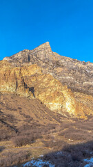 Vertical frame Nature landscape of rocky mountain terrain and blue sky in Provo Canyon Utah