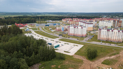 New residential area in small town. Aerial view. Condominium concept.